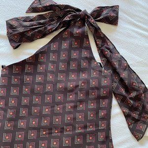 Asymmetrical top with bow